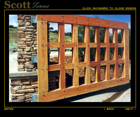 WOOD AND IRON AUTO ENTRY GATES WITH GATE OPERATORS