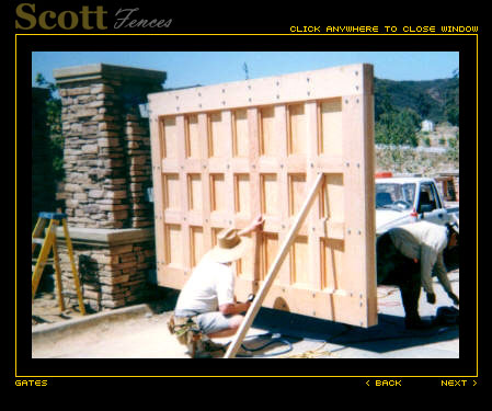 WOOD AND IRON AUTO ENTRY GATES