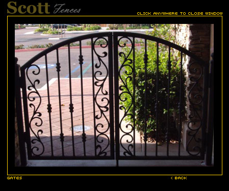 IRON GATES AT RESTAURANT COURTYARD ENTRANCE